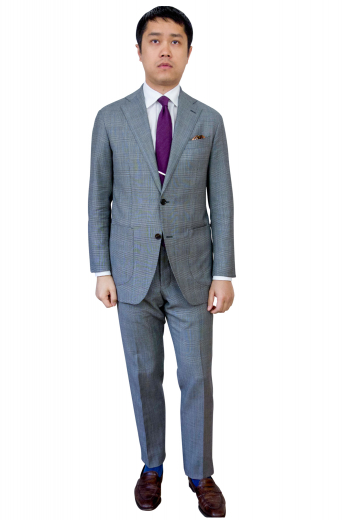 Mens Oxford Grey Tailored Suit This men's suit is tailor made in a fine wool blend and cut to a slim fit, featuring a single breasted button closure and notch lapels.