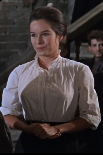 Doctor Zhivago is a multi-award winning 1965 war romance film that features beautiful movie costumes that you can now shop here, including this stunning white high collar blouse with frill detailing matching that of the blouse in Doctor Zhivago.